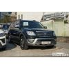 56577