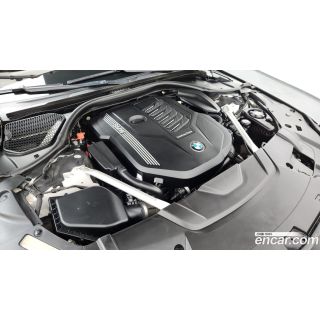 394887