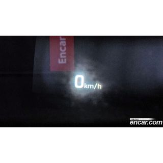 307210