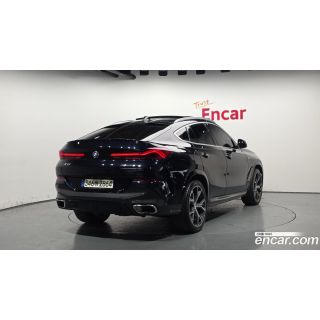 869564