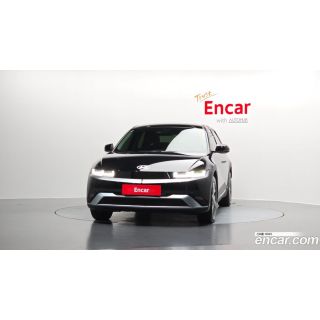 990771