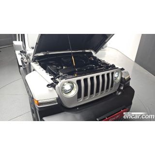 425621