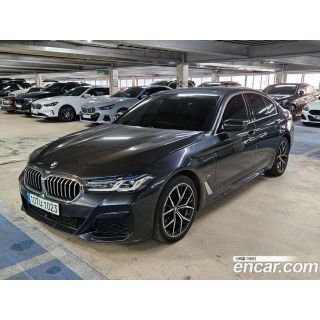 573210