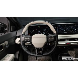 243077