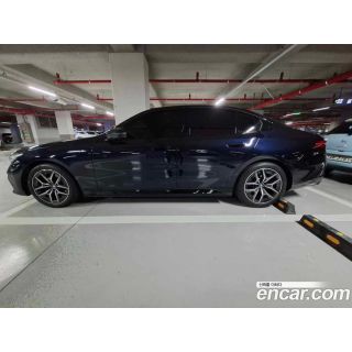 993571