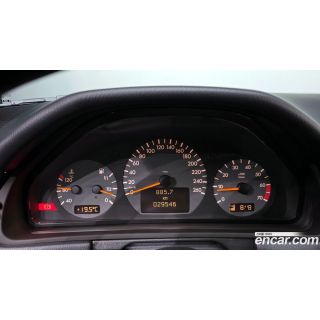 308745