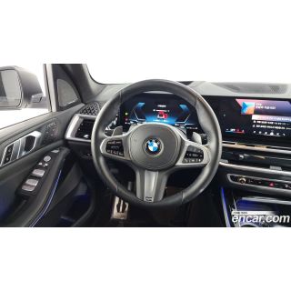 998470