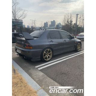 325219
