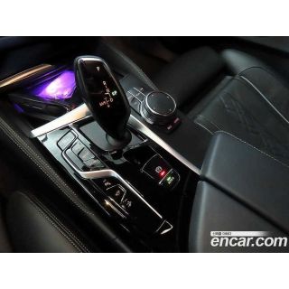 993211