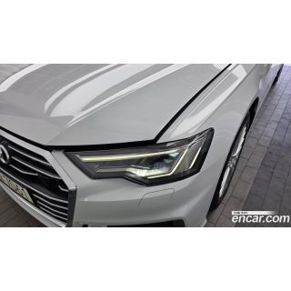 990577