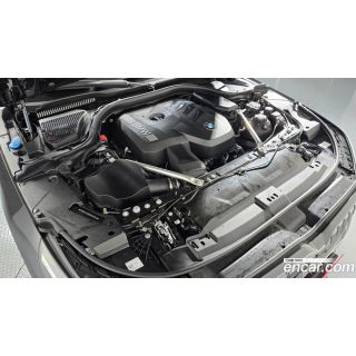 975389