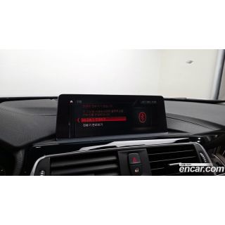 323001