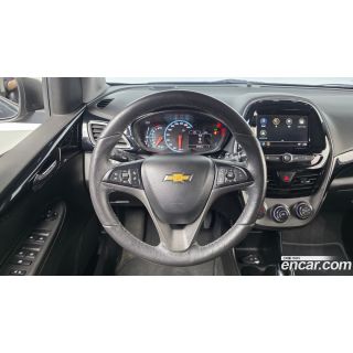 298005