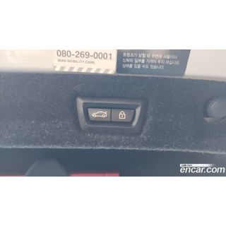 523877
