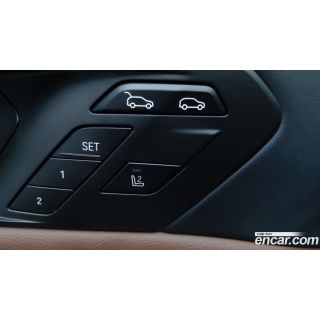 309218