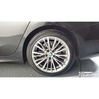 167002