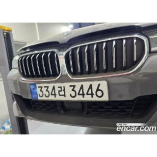 698307