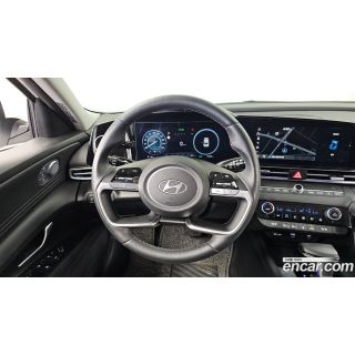 990477