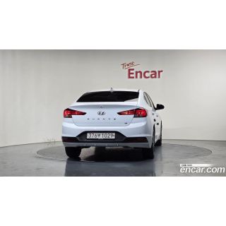 979411