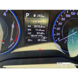 960077