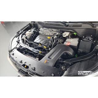 563077