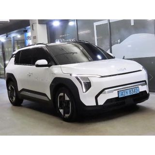 934980