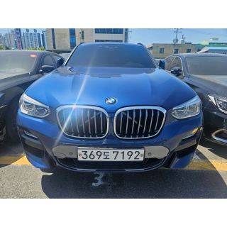 130987