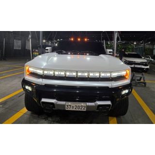 616073