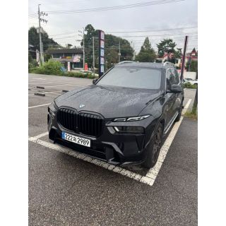 987077