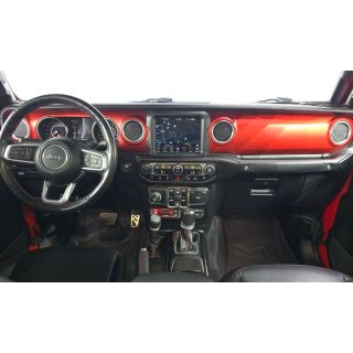 943597