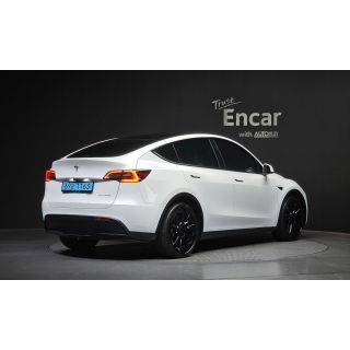 932597
