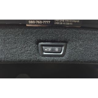 306125