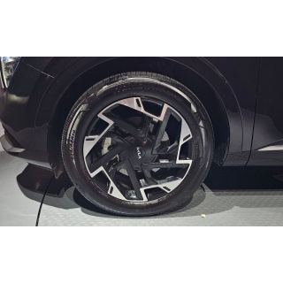 991097