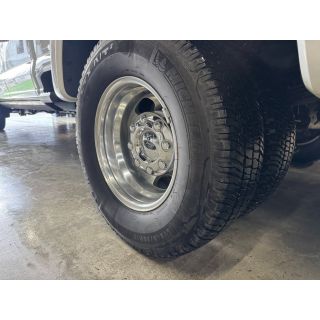 384021