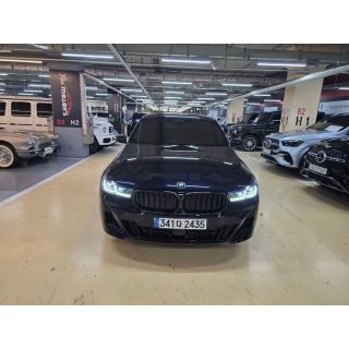 384560