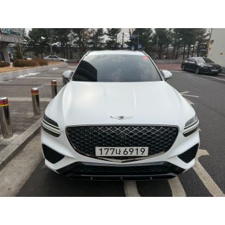 306990