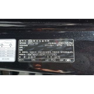457100