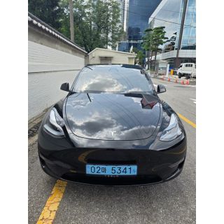 892377