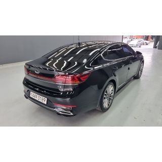 323079