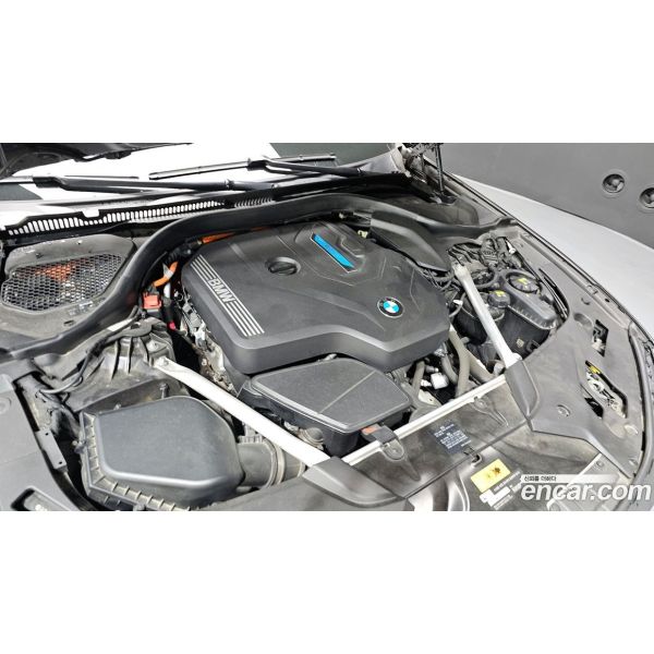 387998