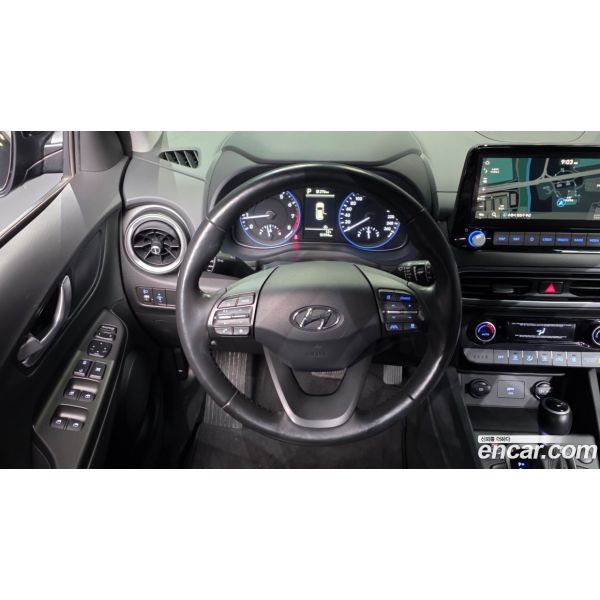 932477