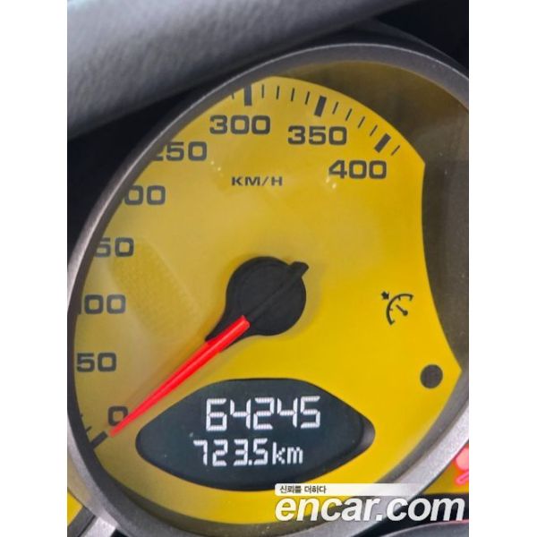 313210