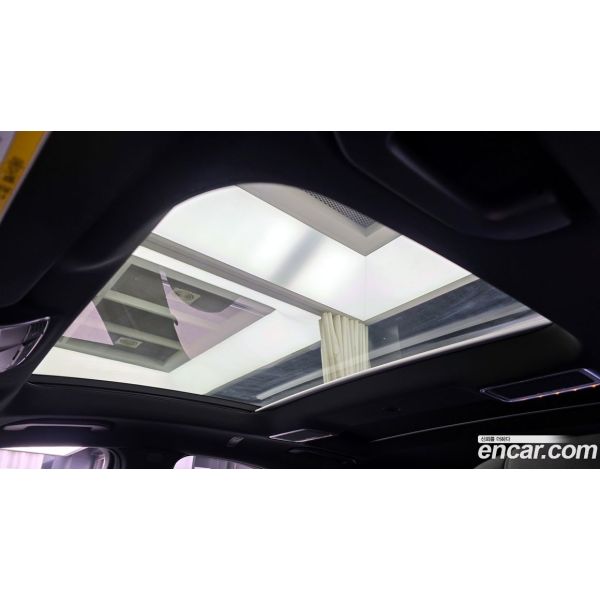 991210