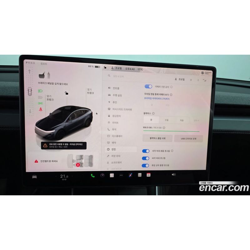 357077