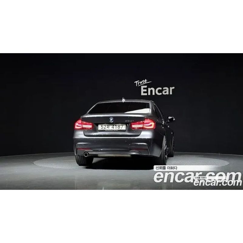306890