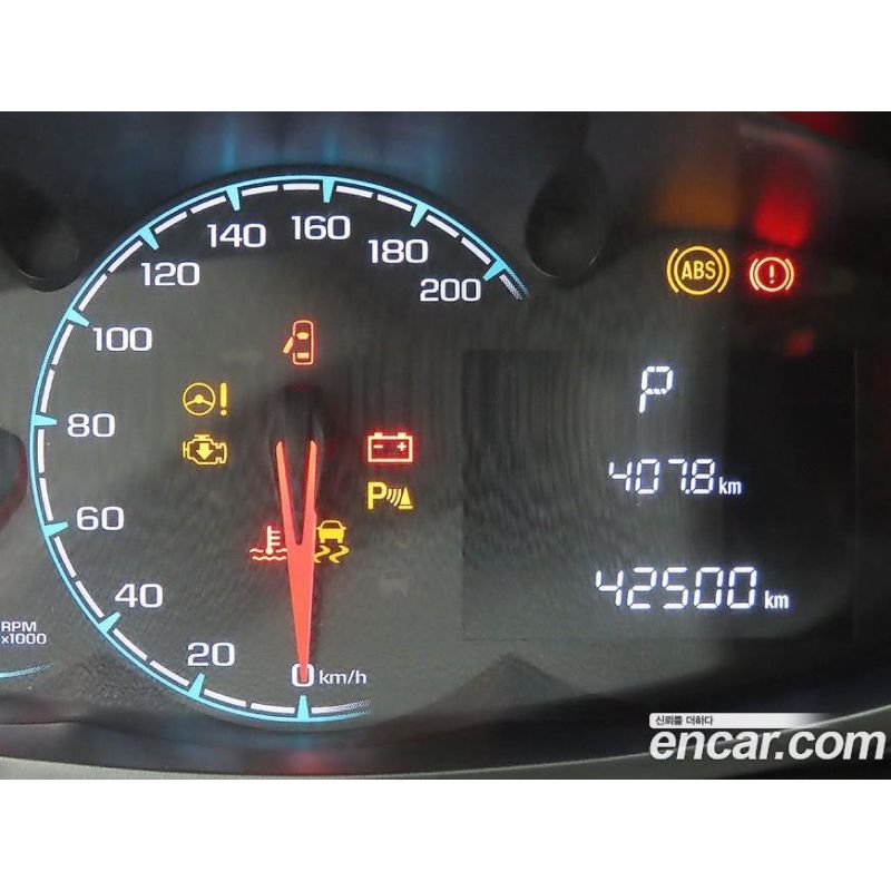 166011
