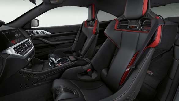 Интерьер BMW M4 — спортивные сиденья M Carbon, BMW Curved Display