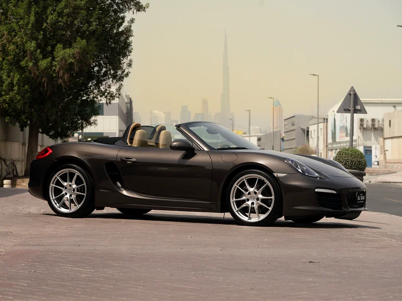 Экстерьер Boxster GTS: мягкая крыша, аэродинамика, чёрные акценты